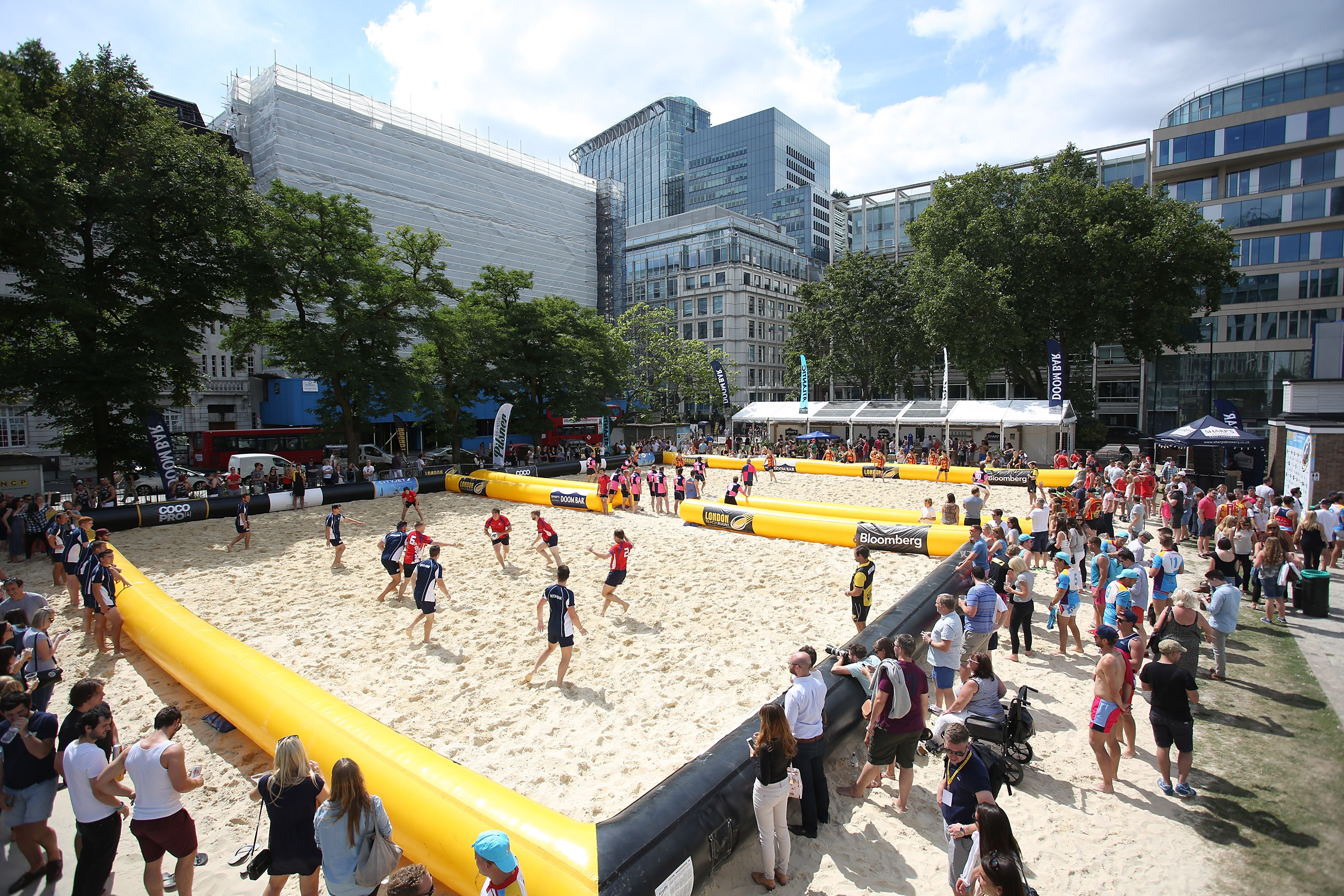 View looking over a beach rugby game